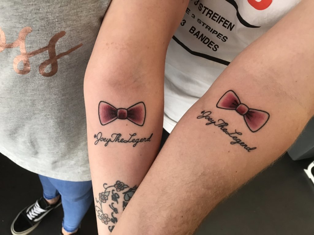 Hundreds turn up to get bow tie tattoos in support of 10-year-old brain haemorrhage survivor Joey the Legend